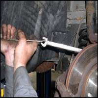 Remove Caliper Mounting Bracket Bolts