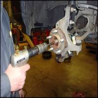 Loosen axle shaft